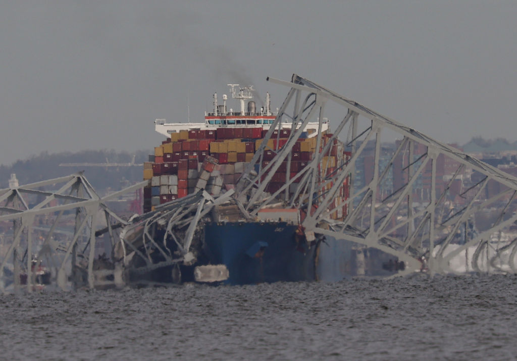 PASADENA, MARYLAND - MARCH 26:  Cargo ship The Dali is shown after running into and collapsing Baltimore's Francis Scott Key Bridge on March 26, 2024 in Pasadena, Maryland.  Rescuers are searching for at least seven people, authorities say, while two others have been pulled from the Patapsco River (Photo by Kevin Dietsch/Getty Images)