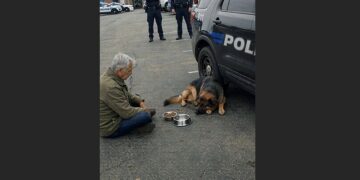 After His K9 Handler Died, a German Shepherd Refused to Leave Their Old Police Car. For Days, He Waited Beside It Until a Retired Officer Sat Down on the Pavement and Stayed.